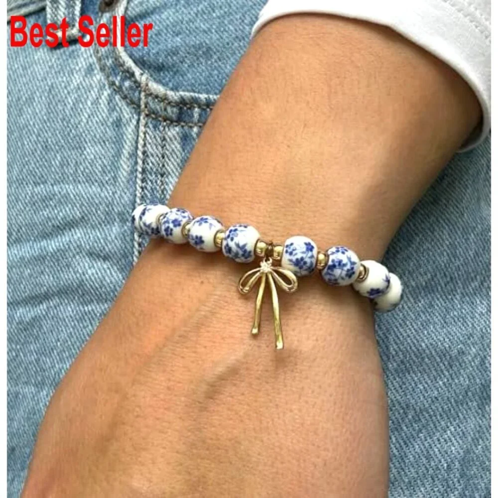 Handmade Stretch Beaded Bracelet with Gold Plated Bow Charm